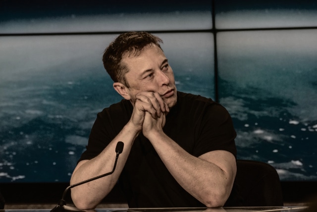 Elon_Musk_at_a_Press_Conference-1-1