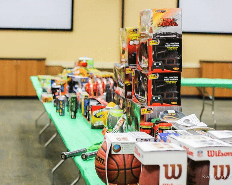 jp-associates-realtors-holiday-scholarship-event-toys