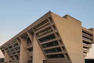 Dallas City Hall building exterior with overcast sky