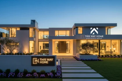 Contemporary luxury home with expansive glass windows and skyline view