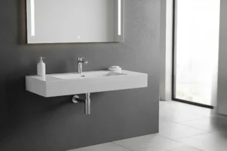 Wall-mounted tap freeing basin space