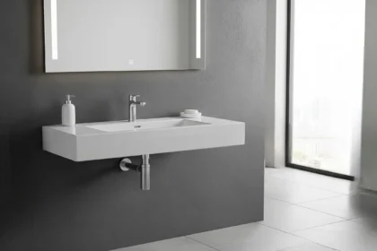 Wall-mounted tap freeing basin space