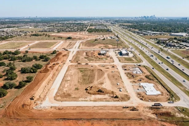 Aerial view of development-stage land near a North Texas highway corridor