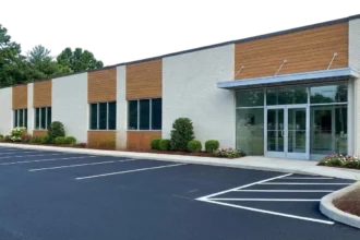 Refreshed Austin commercial building exterior with newly sealed parking lot