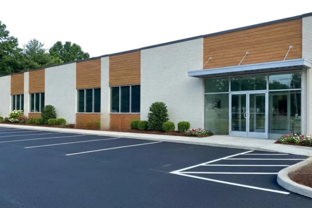 Refreshed Austin commercial building exterior with newly sealed parking lot