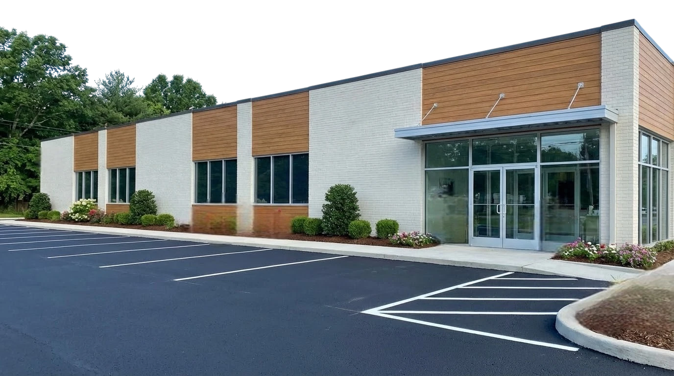 Refreshed Austin commercial building exterior with newly sealed parking lot