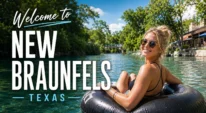 A girl tubing the Comal River near historic Gruene in New Braunfels, Texas