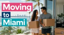 Couple moving to Miami near palm trees, condos, and Biscayne Bay